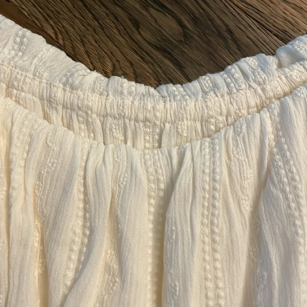 Express Cream Ruffle Off-Shoulder Romper - Picture 16 of 17